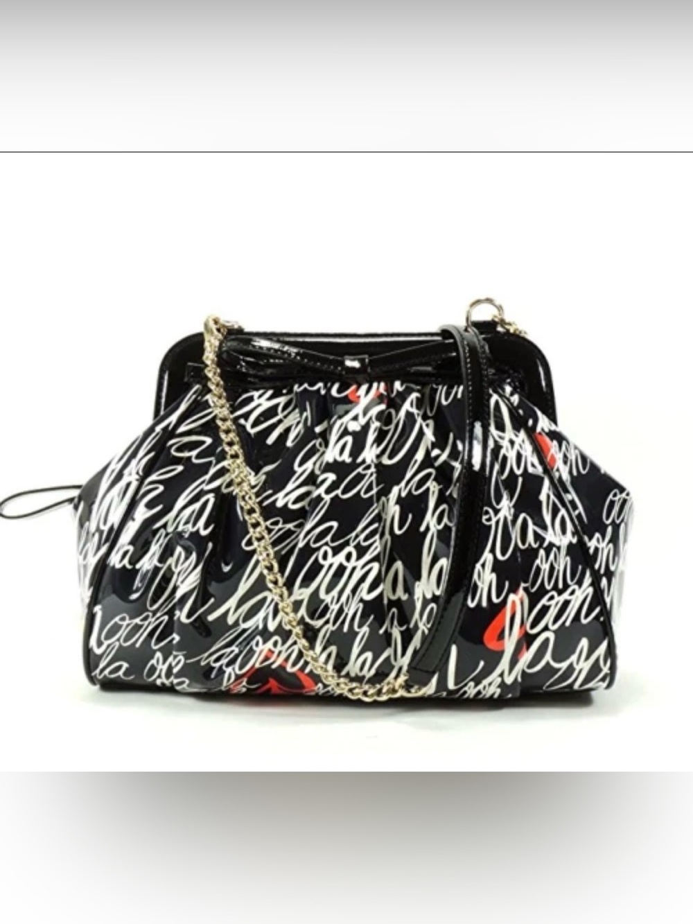 Kate spade “ooh la la” Lizzie clutch purse in black white and red with bow.